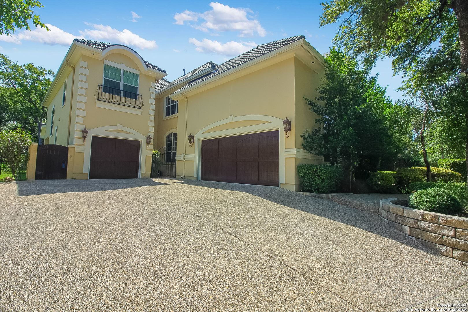 7327 Hovingham San Antonio, TX 78257 - Photo 3 of 26 a front view of a house with a yard and garage