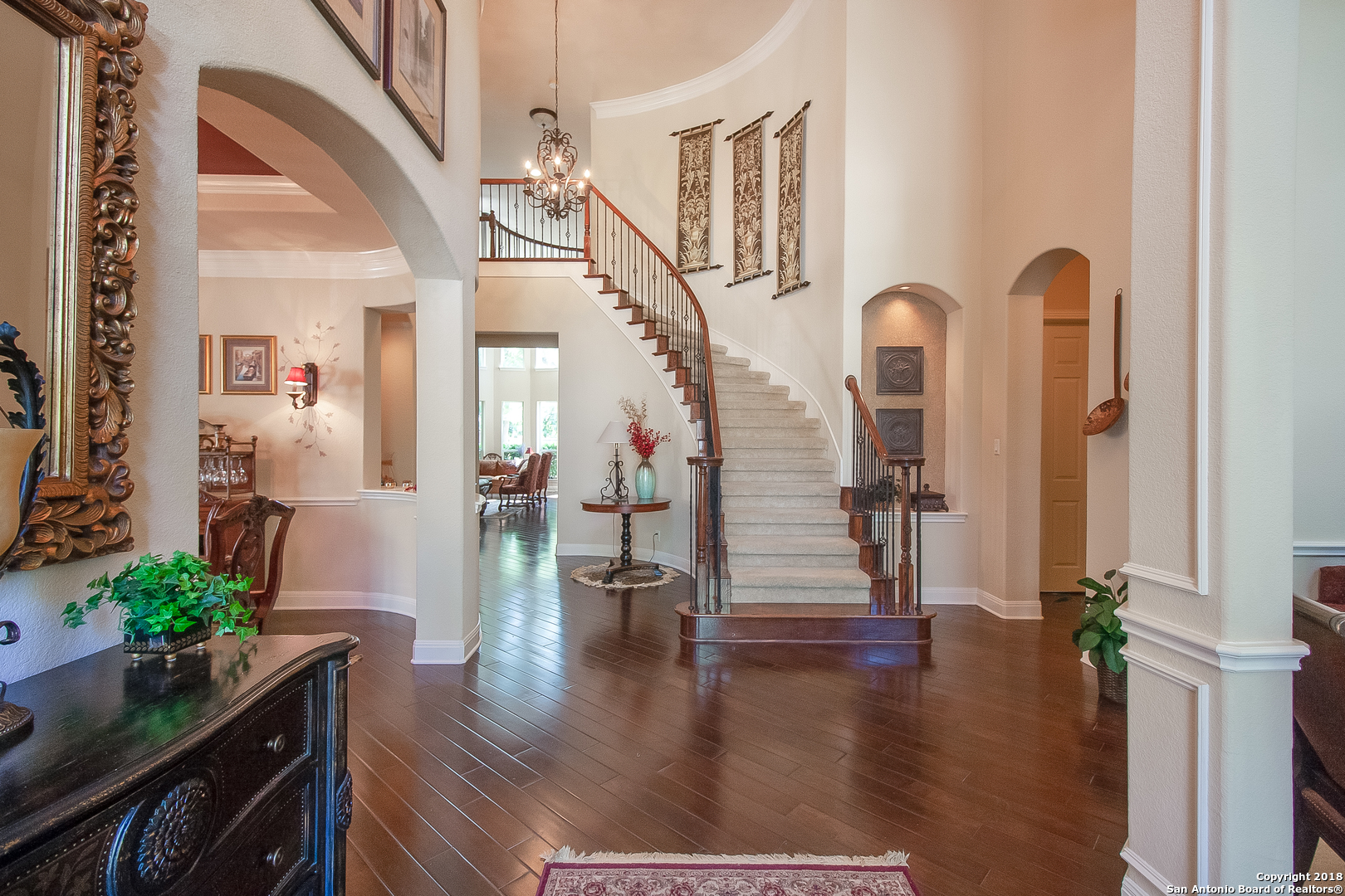 7327 Hovingham San Antonio, TX 78257 - Photo 6 of 26 a view of entryway with livingroom and wooden floor