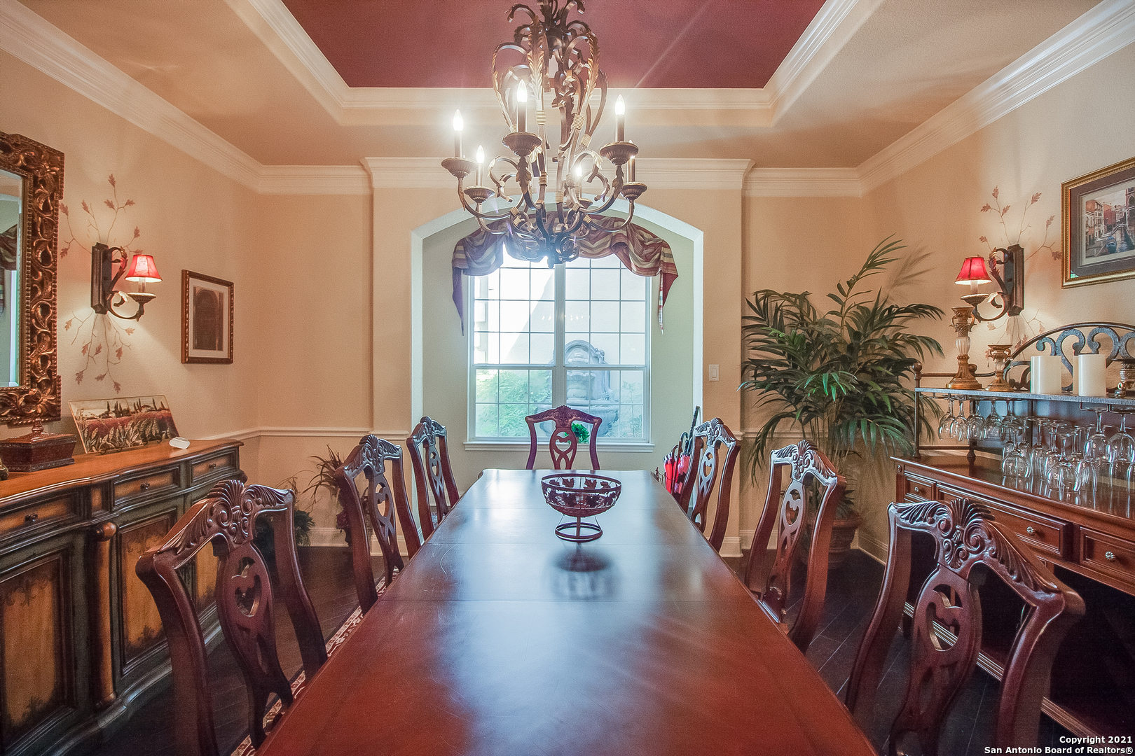 7327 Hovingham San Antonio, TX 78257 - Photo 7 of 26 a living room with furniture and a chandelier