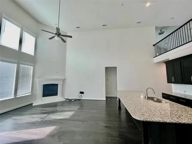 a workspace with furniture fireplace and a window