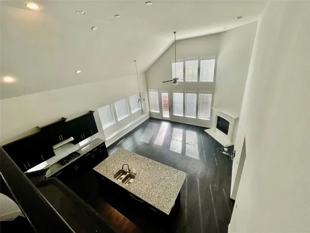 walk in closet with wooden floor
