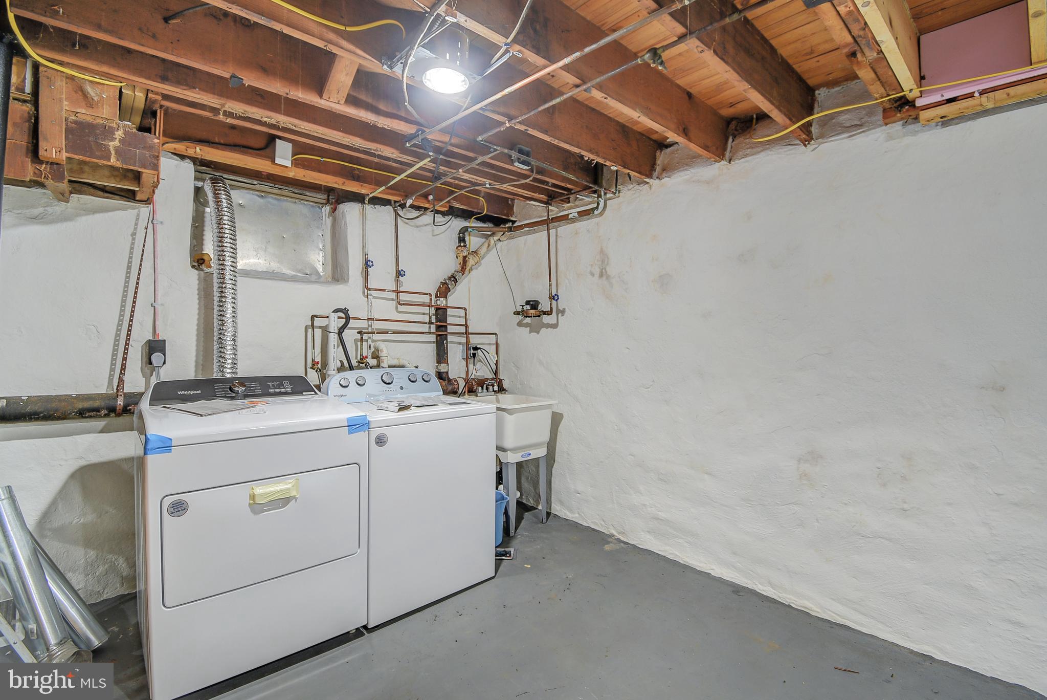 115 Locust Street Newtown Square, PA 19073 - Photo 13 of 17 a utility room with dryer and washer