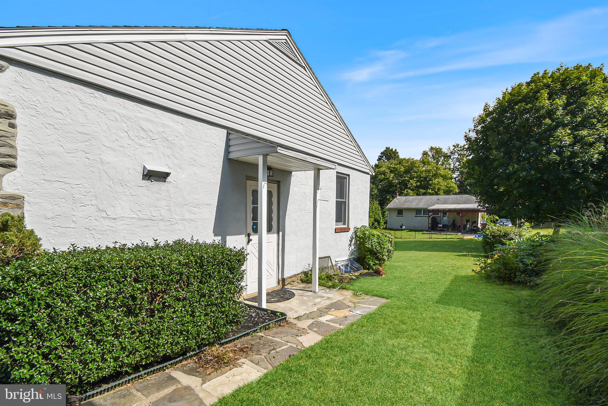 115 Locust Street Newtown Square, PA 19073 - Photo 14 of 17 a view of a house with a yard