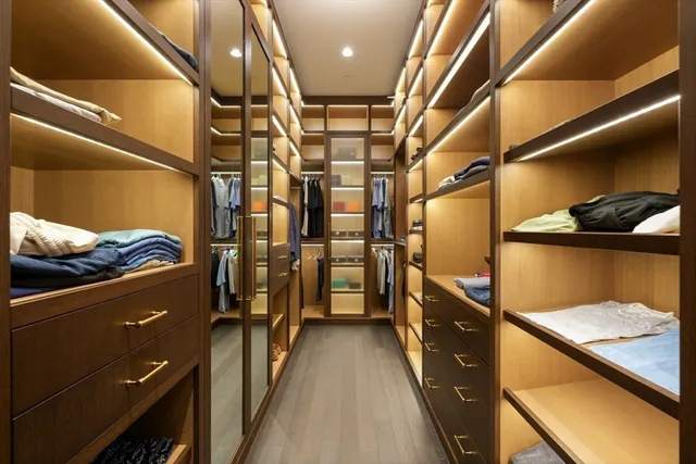 a living room with furniture a rug and a window