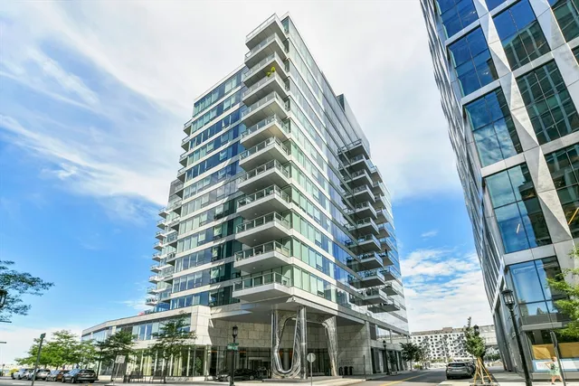 a view of tall buildings and lake view