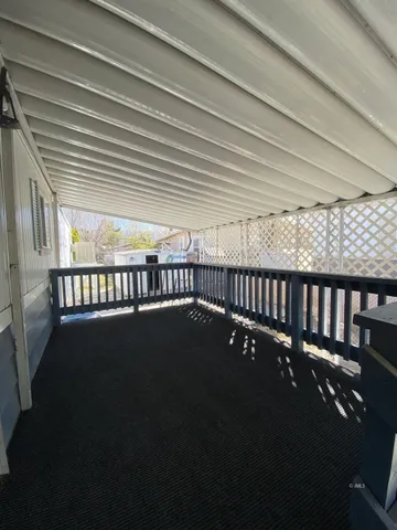 a view of swimming pool and deck