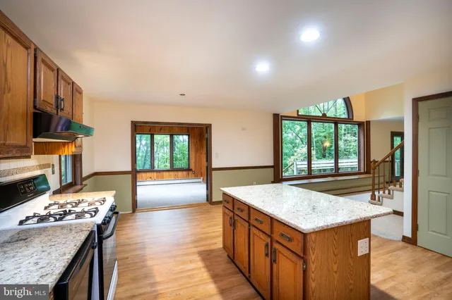 a lobby with furniture and a large window