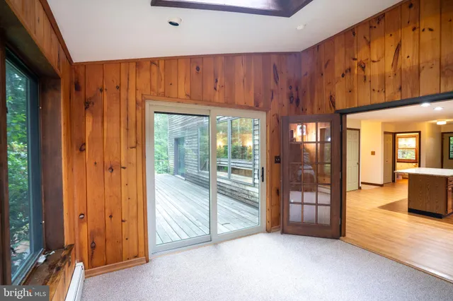 a view of outdoor space with deck and yard