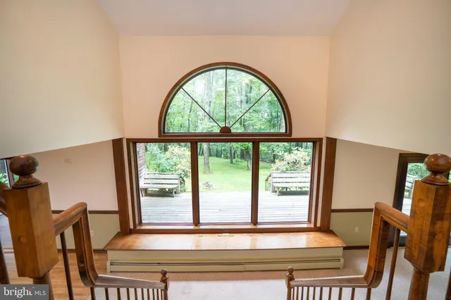 a view of entryway with wooden floor