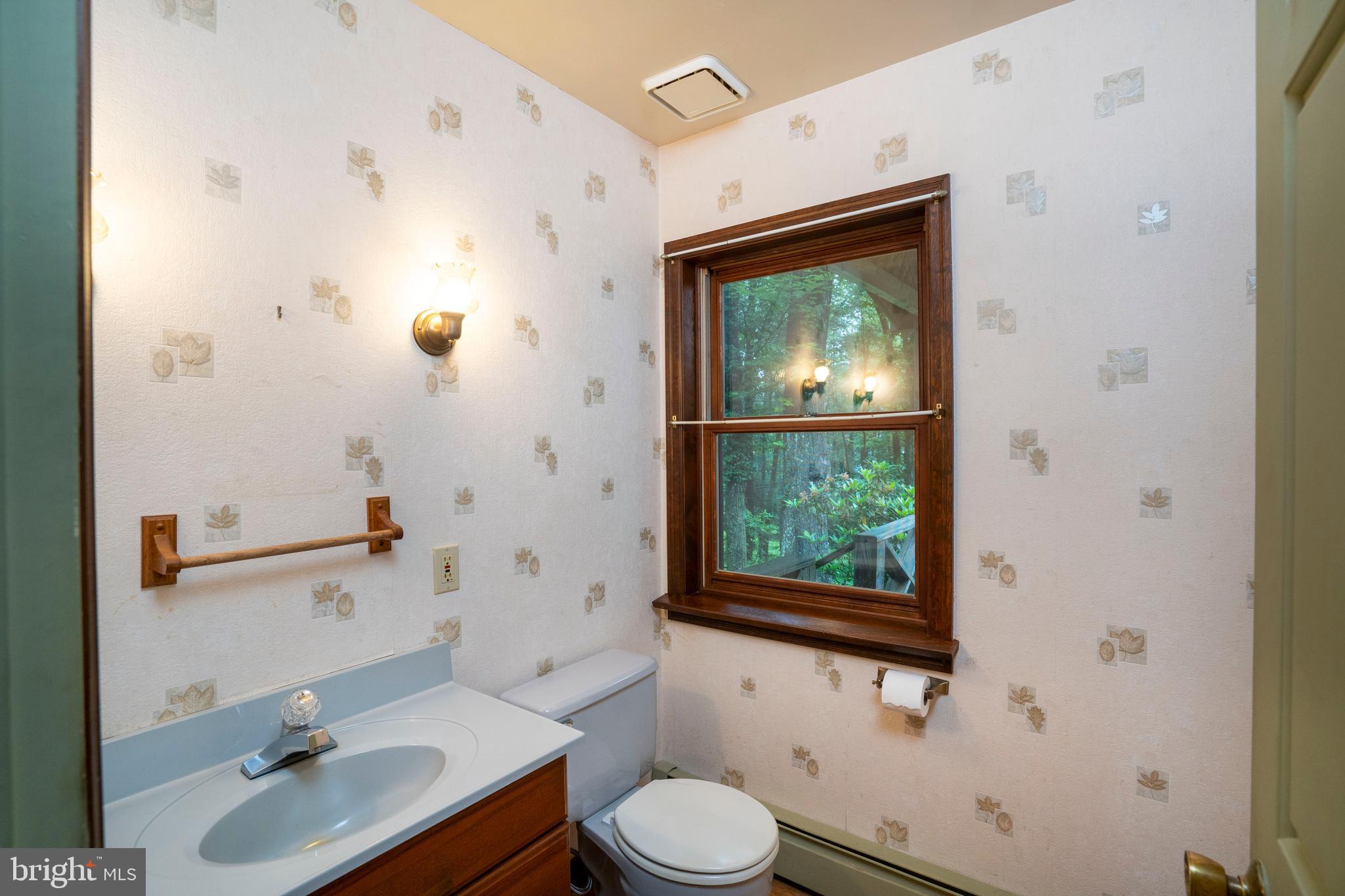 1040 Radio Club Road Montoursville, PA 17754 - Photo 26 of 58 a bathroom with a sink toilet and shower