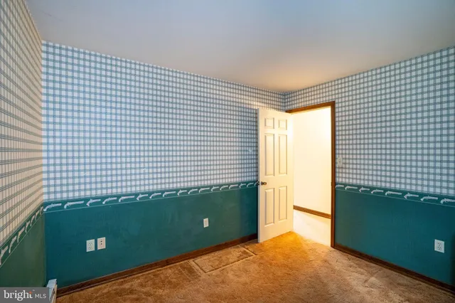 a view of a hallway with windows