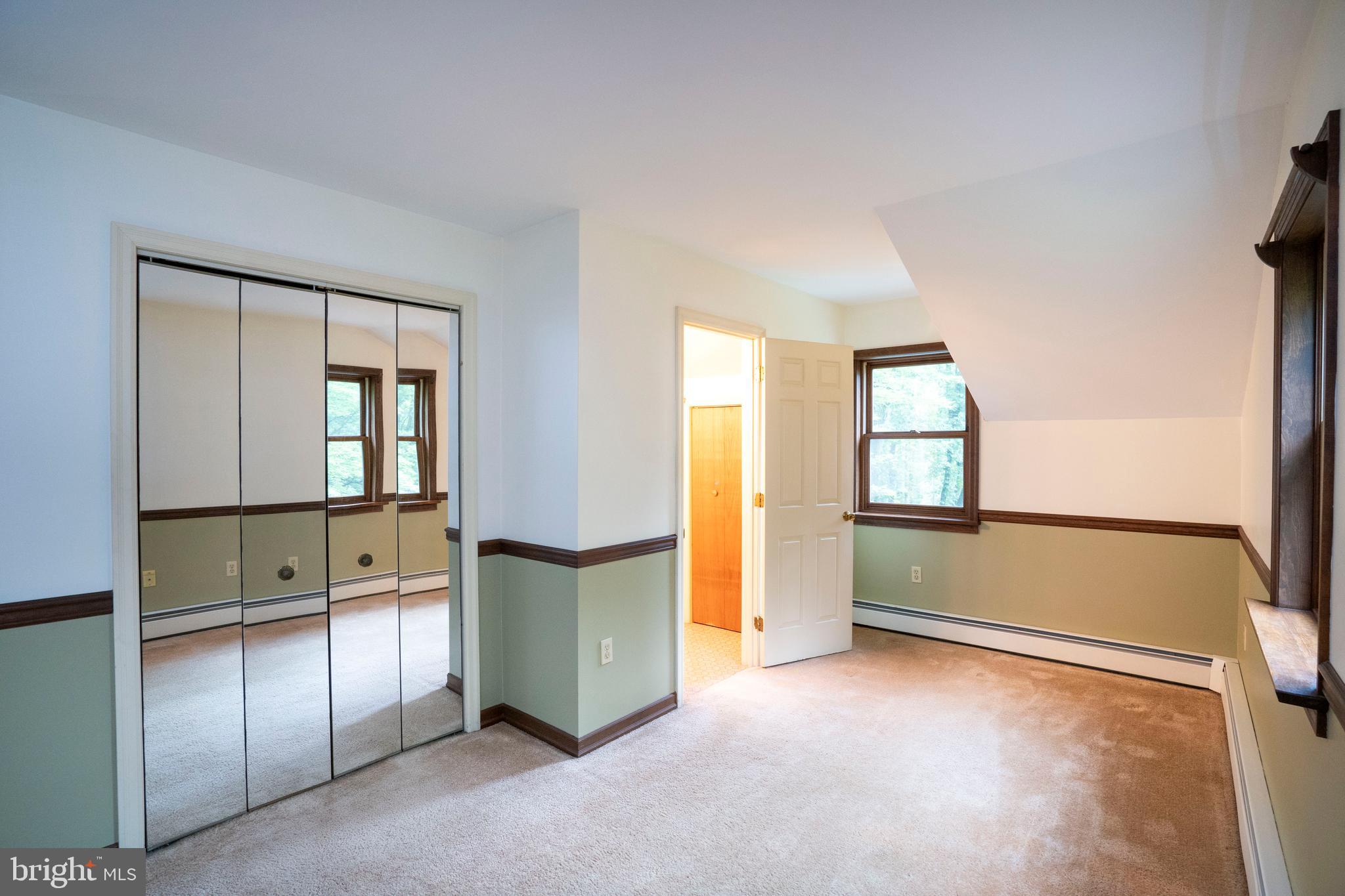 1040 Radio Club Road Montoursville, PA 17754 - Photo 34 of 58 an empty room with windows and closet