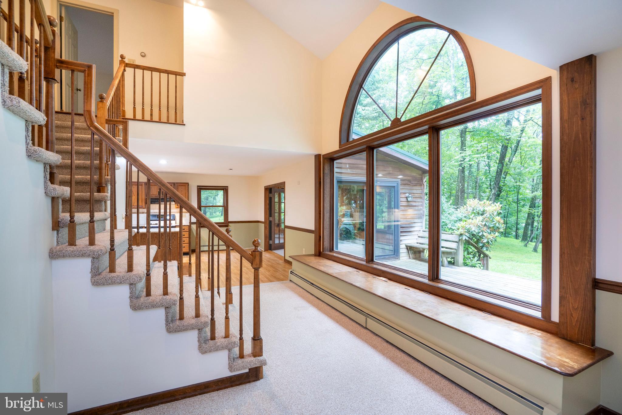 1040 Radio Club Road Montoursville, PA 17754 - Photo 4 of 58 a view of staircase with a large window