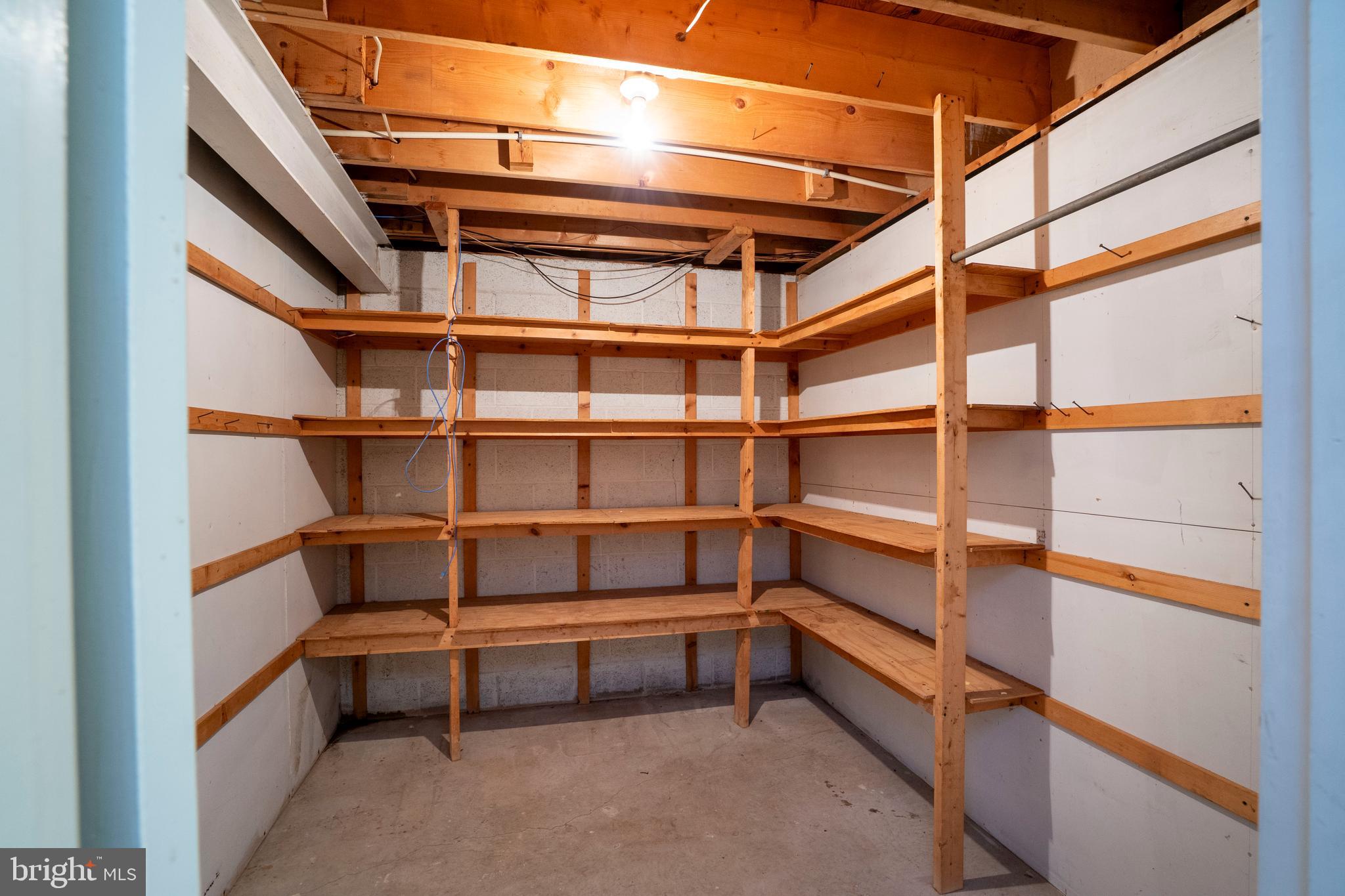 1040 Radio Club Road Montoursville, PA 17754 - Photo 50 of 58 a view of an empty room with racks on the wall