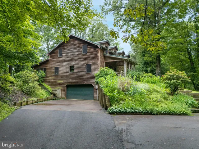 a view of closet with wooden floor