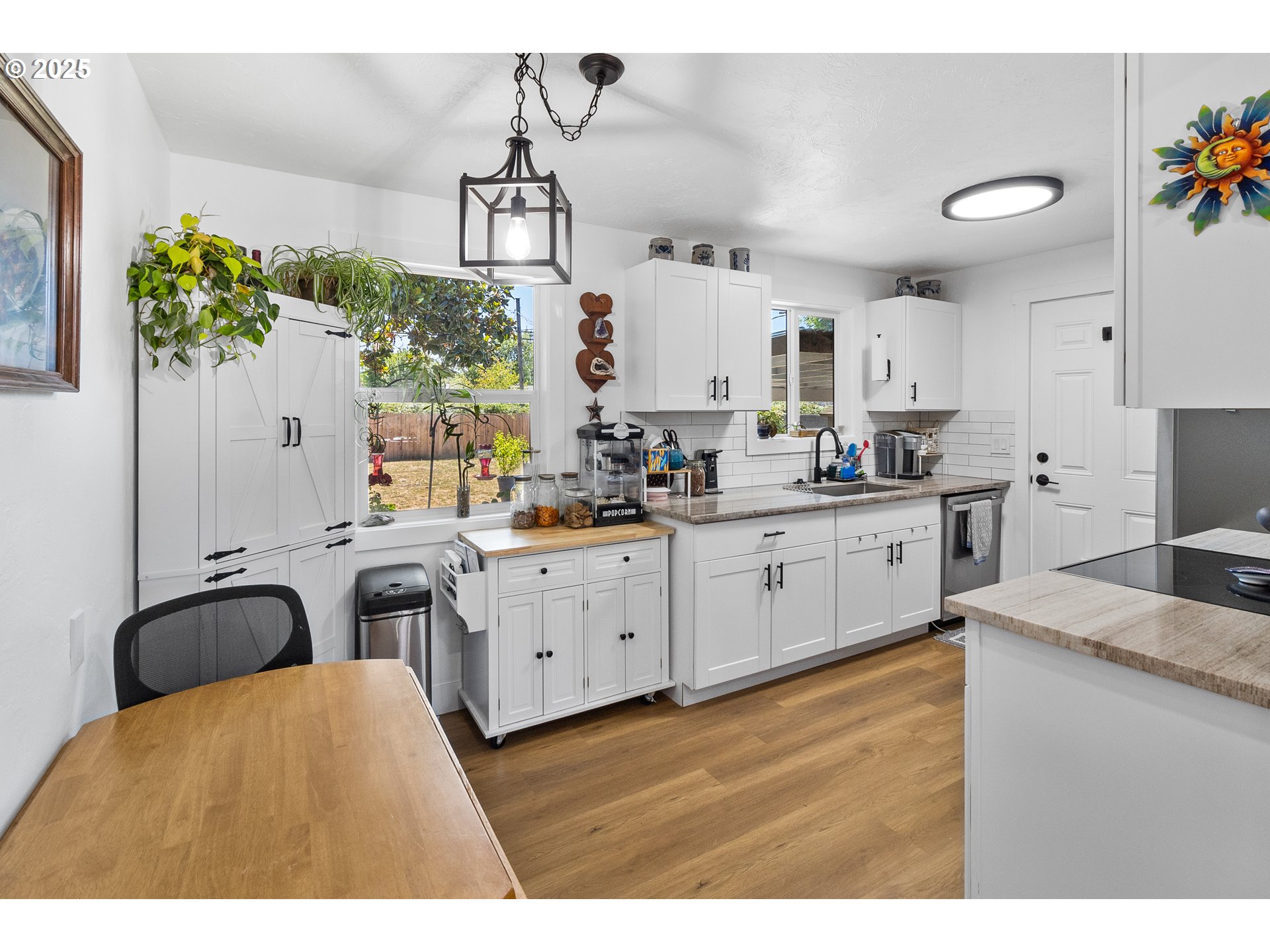 2681 D Street Springfield, OR 97477 - Photo 11 of 24 a kitchen with counter top space sink stove and refrigerator