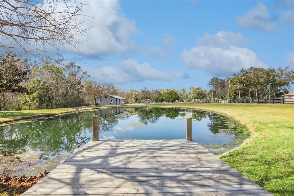 323 McLain Lane Geneva, FL 32732 - Photo 14 of 70 a view of a lake with a big yard