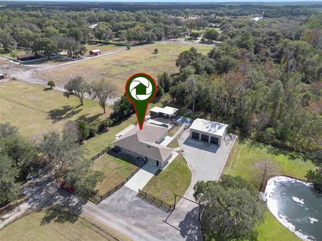 323 McLain Lane Geneva, FL 32732 - Photo 61 of 70 an aerial view of a house with a swimming pool
