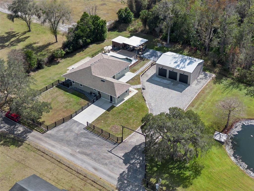 323 McLain Lane Geneva, FL 32732 - Photo 65 of 70 an aerial view of a house with a yard