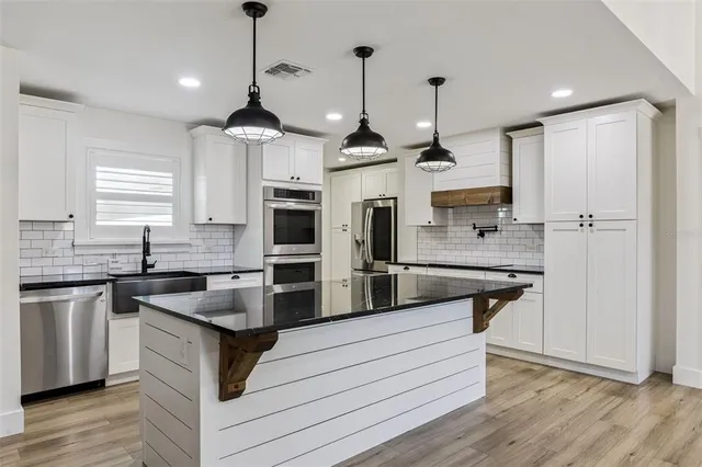 a view of a swimming pool with a lounge chair