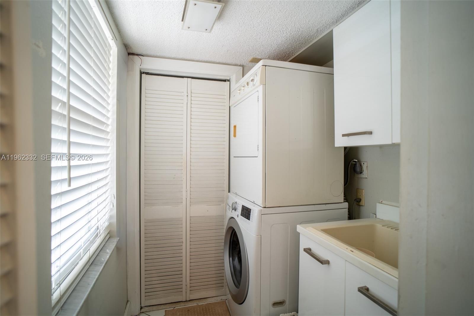 3510 Oaks Way, Unit 408 Pompano Beach, FL 33069 - Photo 11 of 27 a bathroom with a sink a toilet and a shower