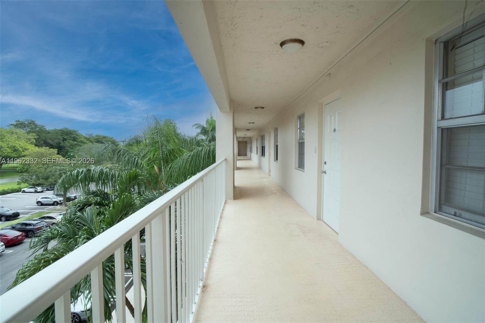 3510 Oaks Way, Unit 408 Pompano Beach, FL 33069 - Photo 7 of 27 a view of a balcony