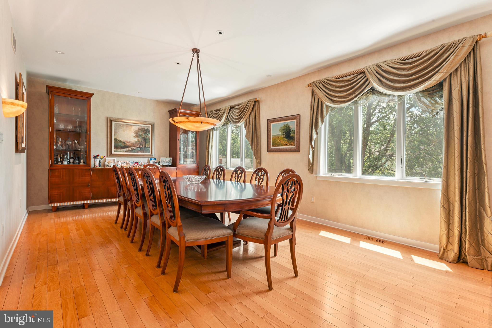 1427 Byberry Road Huntingdon Valley, PA 19006 - Photo 15 of 46 a view of a dining room with furniture window and wooden floor