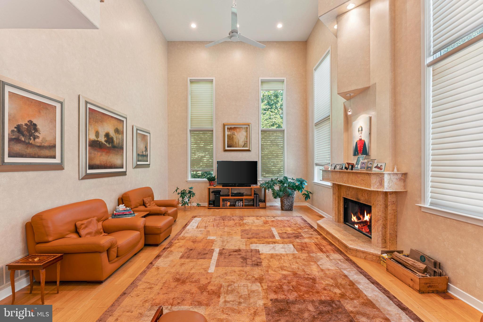 1427 Byberry Road Huntingdon Valley, PA 19006 - Photo 26 of 46 a living room with furniture fireplace and window