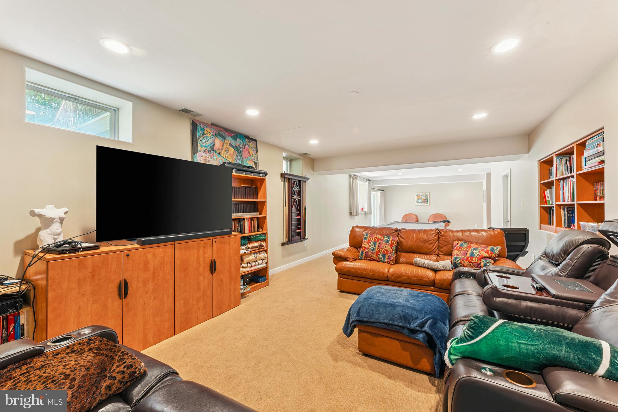 1427 Byberry Road Huntingdon Valley, PA 19006 - Photo 42 of 46 a living room with furniture and a flat screen tv