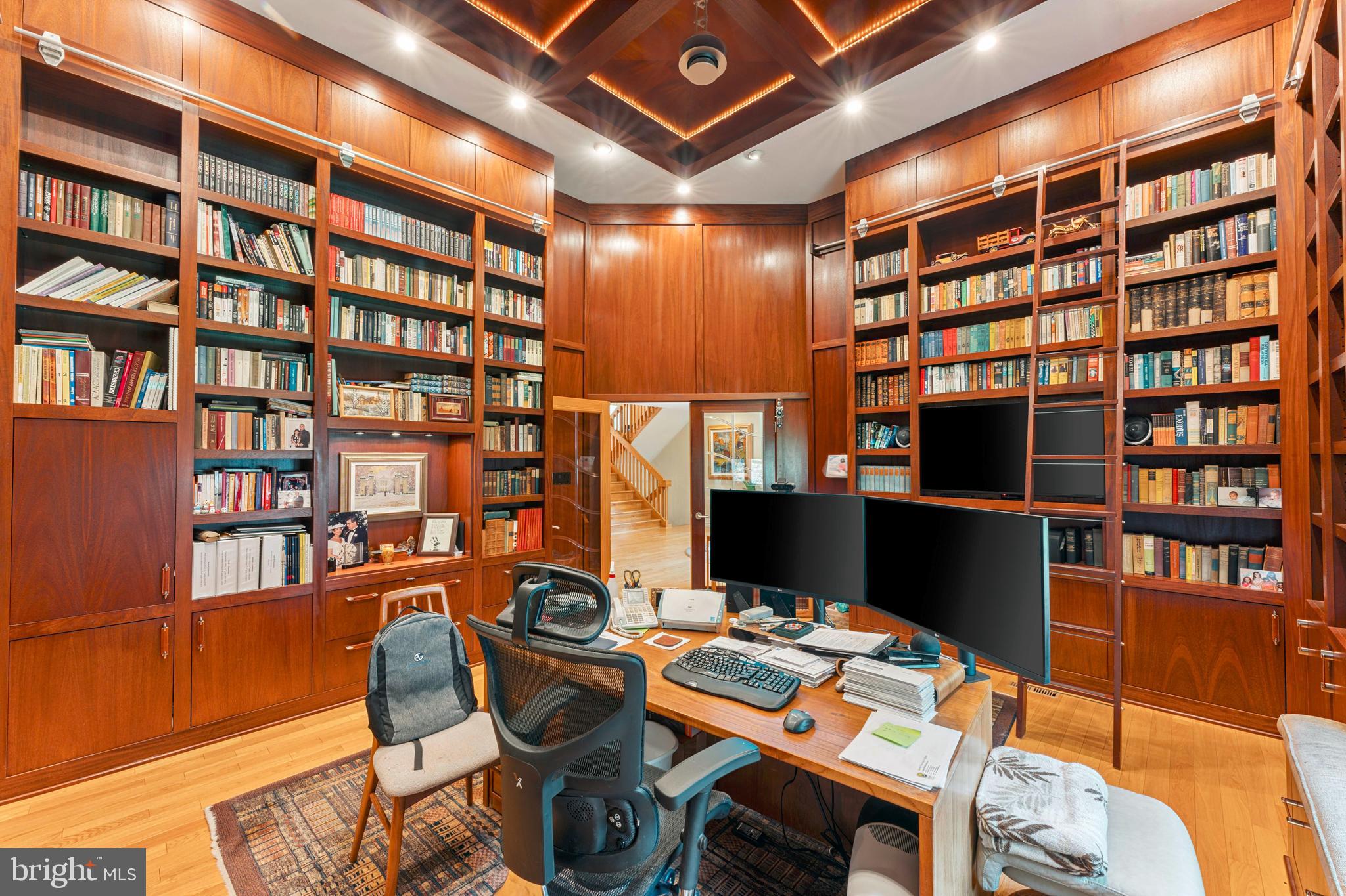 1427 Byberry Road Huntingdon Valley, PA 19006 - Photo 7 of 46 a work room with furniture and bookshelf
