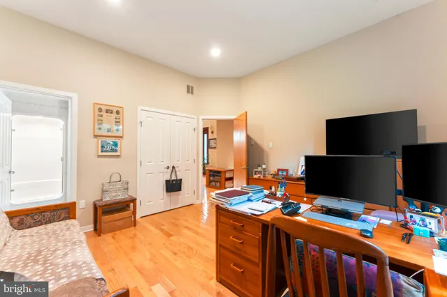 a view of a kitchen with stainless steel appliances granite countertop a stove and a sink