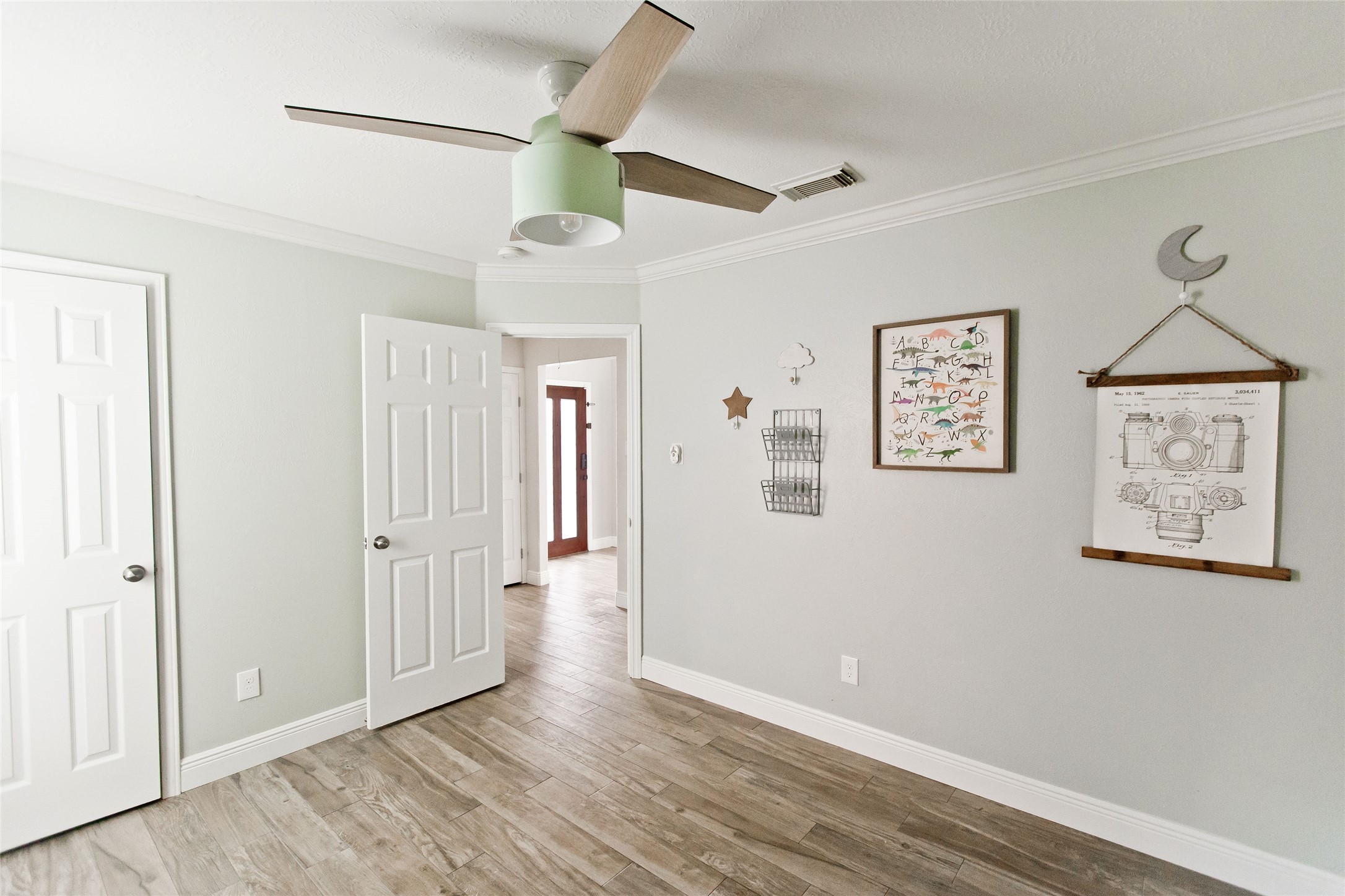 5807 Walkabout Way Katy, TX 77450 - Photo 16 of 25 wooden floor in an empty room
