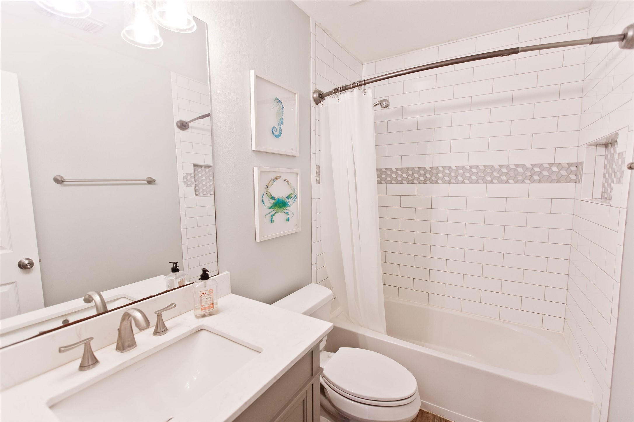 5807 Walkabout Way Katy, TX 77450 - Photo 17 of 25 a bathroom with a sink and a mirror