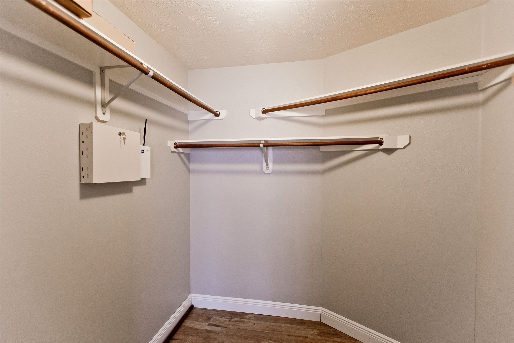 5807 Walkabout Way Katy, TX 77450 - Photo 22 of 25 a view of small space with racks on the wall