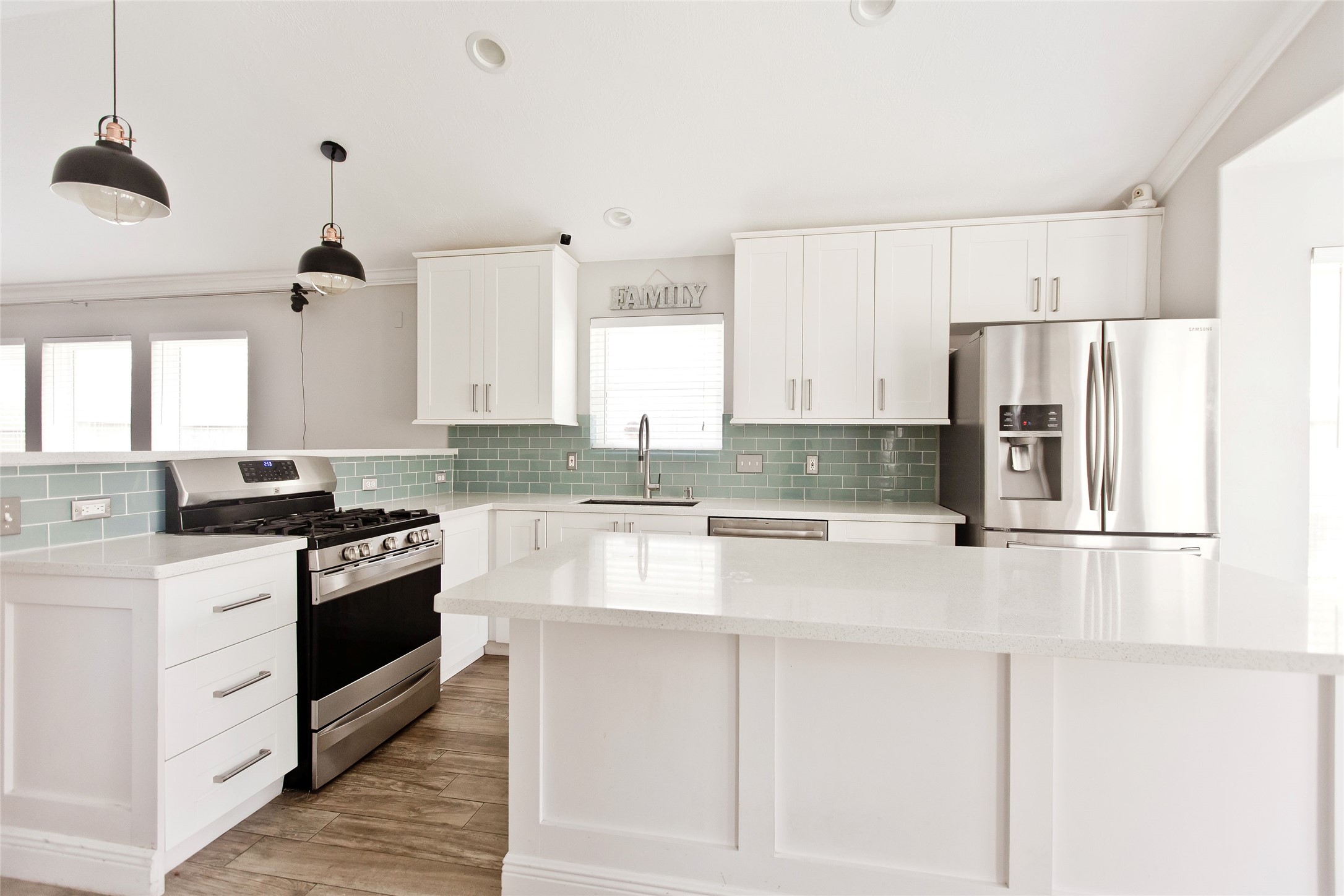 5807 Walkabout Way Katy, TX 77450 - Photo 8 of 25 a large kitchen with stainless steel appliances granite countertop a stove a sink dishwasher and a refrigerator