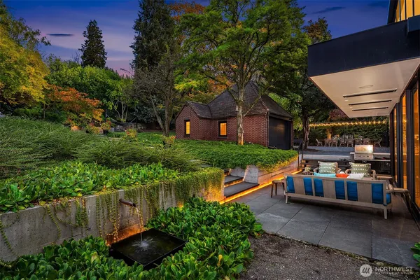 a garden view with a seating space