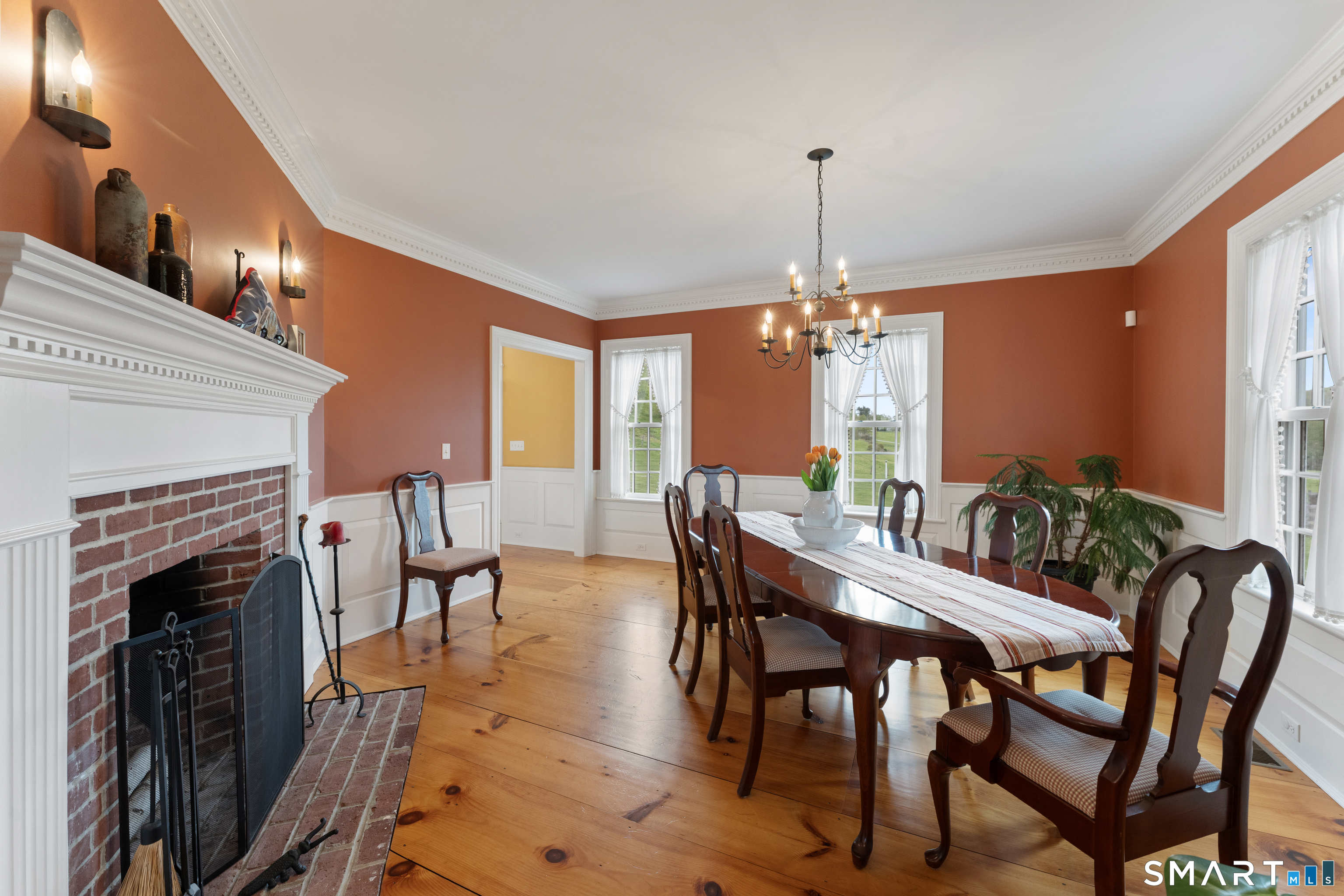 155 Paine Road Woodstock, CT 06281 - Photo 9 of 40 a dining room with furniture window and wooden floor