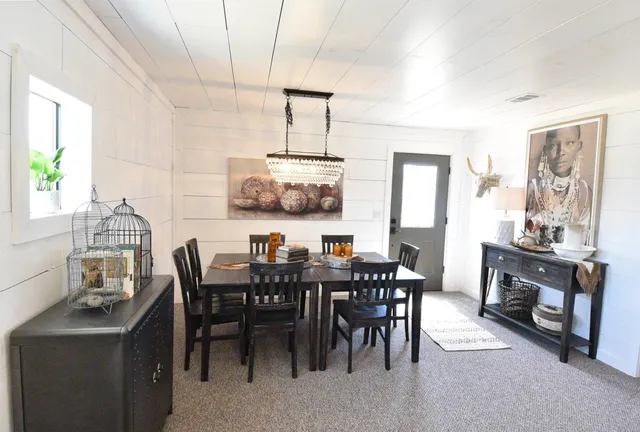 a view of a dining room with furniture