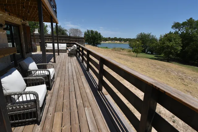 a view of balcony with furniture