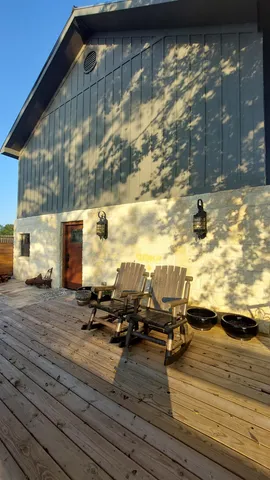 a view of a terrace with seating area