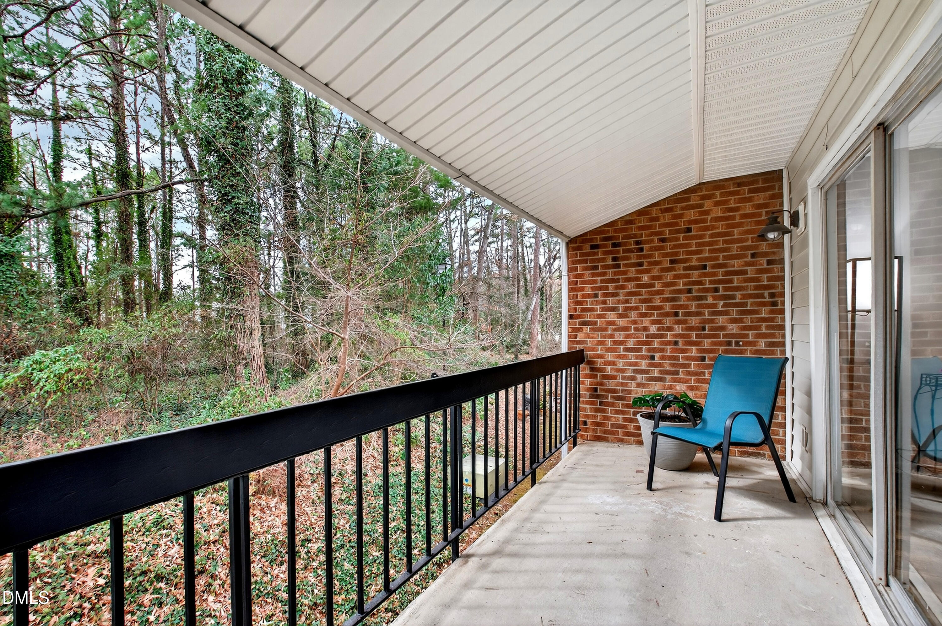 4507 Edwards Mill Road, Unit G Raleigh, NC 27612 - Photo 18 of 19 a view of a two chairs in the balcony