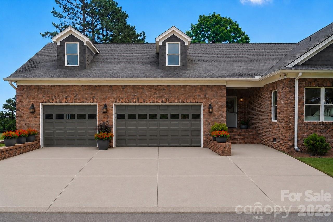 4445 Rowell Road Lancaster, SC 29720 - Photo 27 of 37 a front view of a house with garage