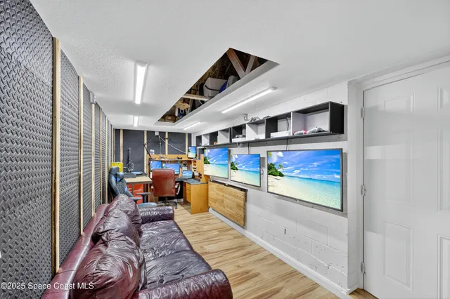 a view of a living room and dining room