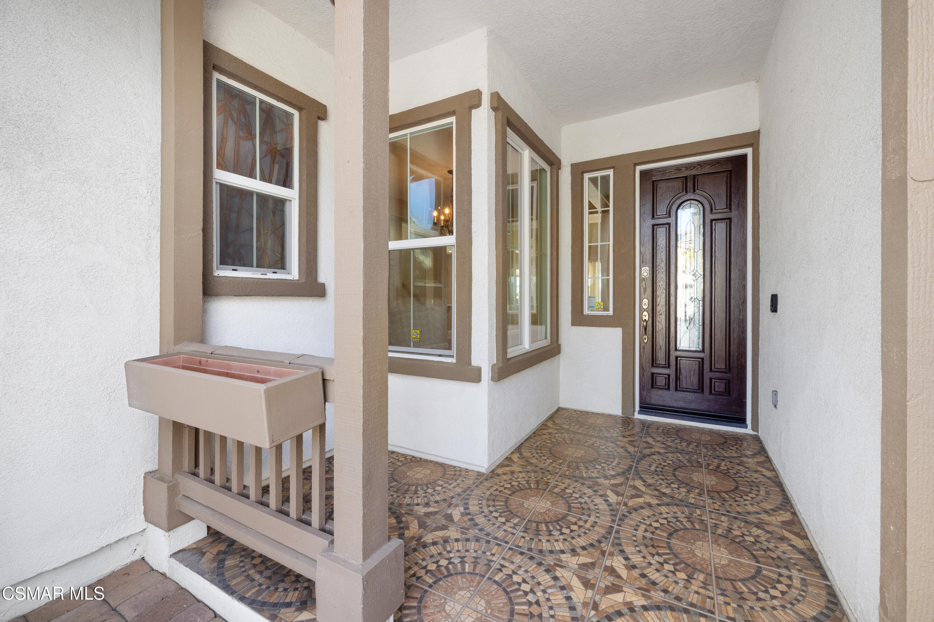4920 Corral Street Simi Valley, CA 93063 - Photo 9 of 54 a view of a hallway with windows