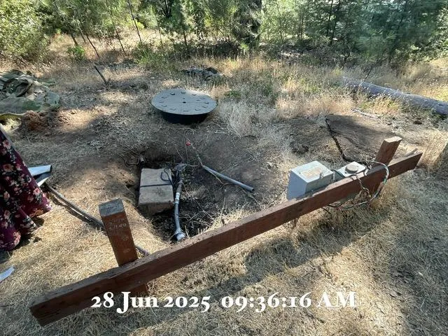 a view of a yard from a balcony