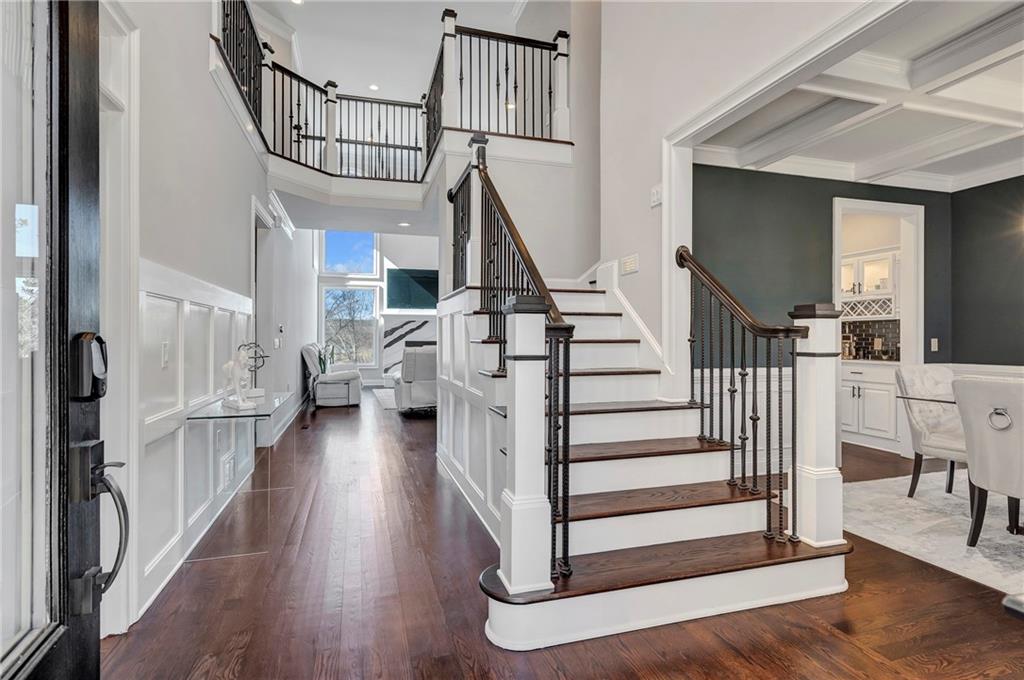 5755 Riley Road Cumming, GA 30028 - Photo 5 of 77 a view of entryway and hall with wooden floor