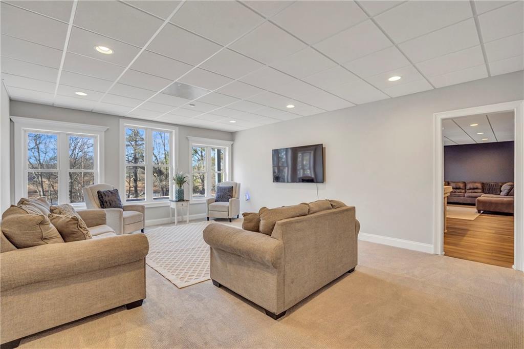 5755 Riley Road Cumming, GA 30028 - Photo 51 of 77 a living room with furniture and a large window