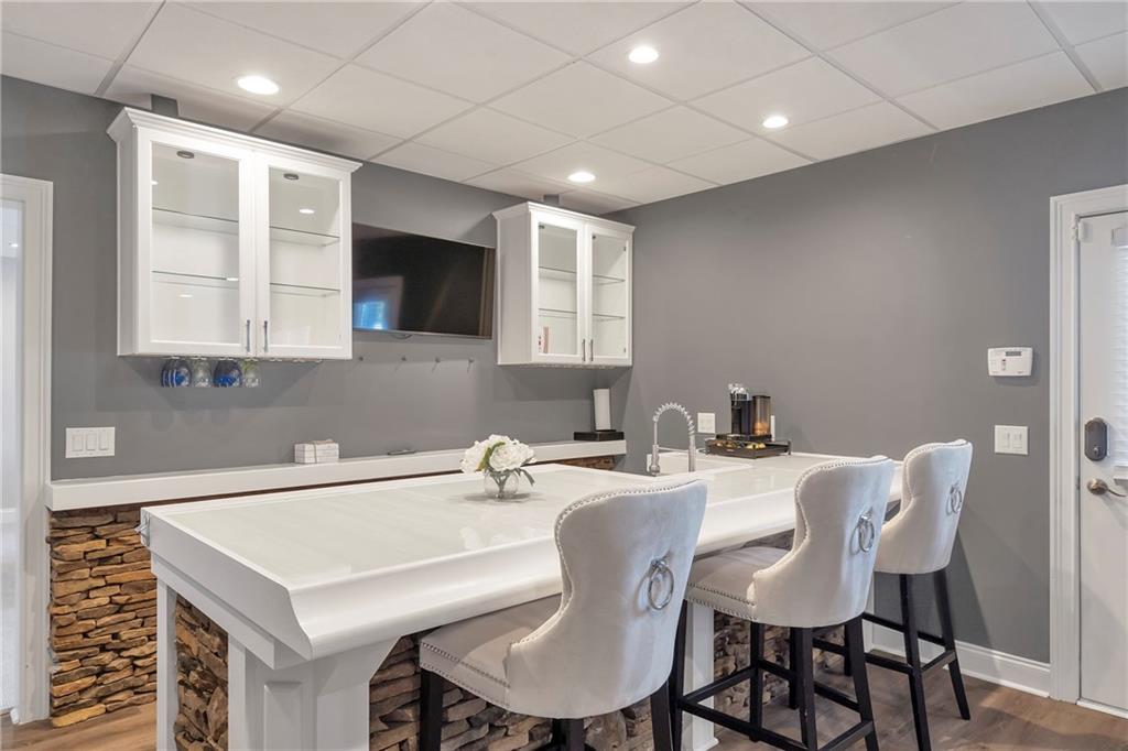 5755 Riley Road Cumming, GA 30028 - Photo 54 of 77 a view of a dining room with furniture