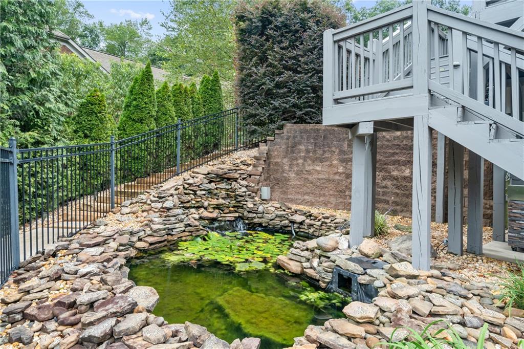 5755 Riley Road Cumming, GA 30028 - Photo 63 of 77 a view of a house with a yard and pathway