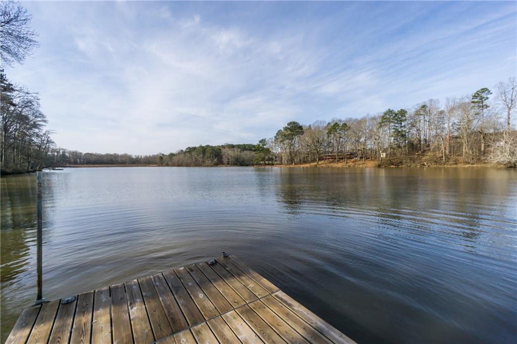 5755 Riley Road Cumming, GA 30028 - Photo 69 of 77 a view of a lake with houses